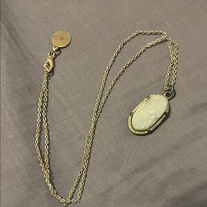 Elegant Gold and Light Blue Pendant Necklace